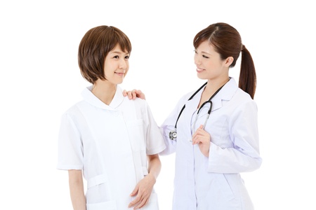 Asian young medical doctor isolated on white backgroundの写真素材