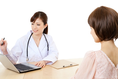 Asian young medical doctor isolated on white backgroundの写真素材