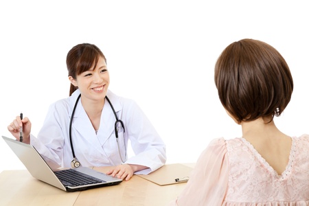 Asian young medical doctor isolated on white backgroundの写真素材