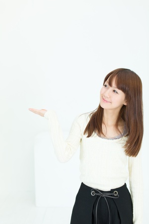 Beautiful asian woman relaxing in the roomの写真素材