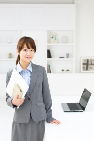 Beautiful asian businesswoman working in officeの写真素材