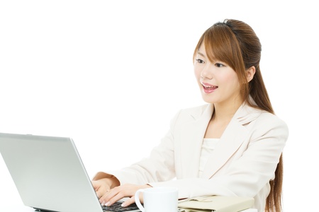 Beautiful asian businesswoman isolated on white background の写真素材