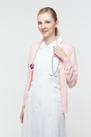 Beautiful caucasian nurse on white backgroundの写真素材