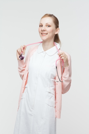 Beautiful caucasian nurse on white backgroundの写真素材
