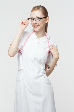 Beautiful caucasian nurse on white backgroundの写真素材