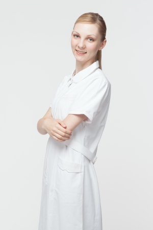 Beautiful caucasian nurse on white backgroundの写真素材