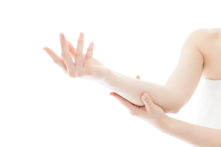 Beautiful young woman hands on white backgroundの写真素材