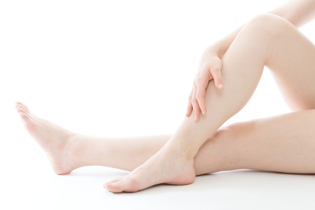 Beautiful young woman legs on white backgroundの写真素材
