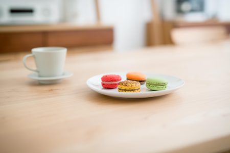 Delicious breakfast some macarons in a dishの写真素材