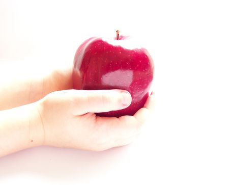 hands with appleの写真素材