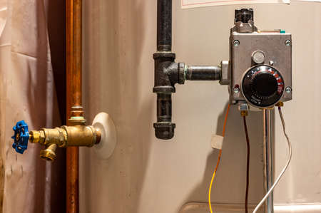 Focus on heating controls of a hot water heater with base plate onの写真素材