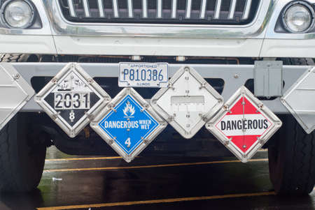Midland, Michigan, USA - 8.2018: Veolia Environmental Services vehicle placards. Veolia is a major...