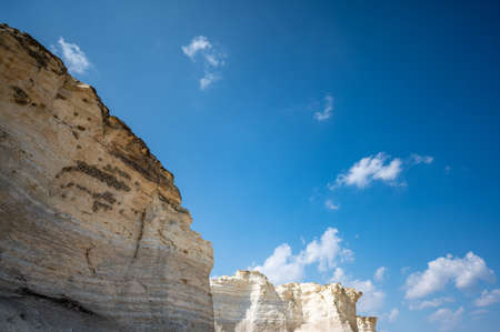 Cliff swallow mud homes built into the cliff face of Monument Rocks in rural Kansas, USAの写真素材
