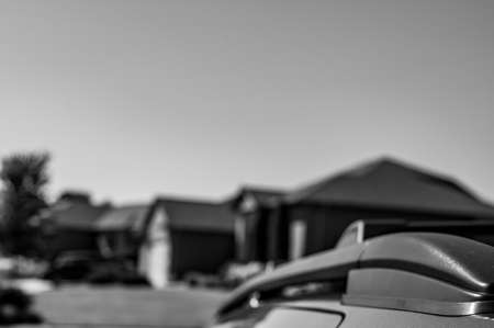 Narrow selective focus on the roof rack with cross bars installed on top of a vehicleの写真素材
