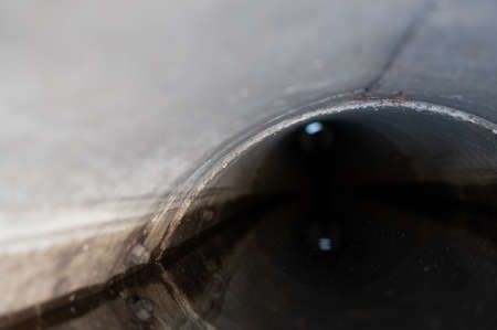 water surface level view from inside a concrete culvertの写真素材