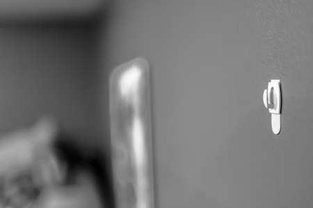 Selective focus on adhesive strip wall hanger that can be removed by pulling tapeの写真素材