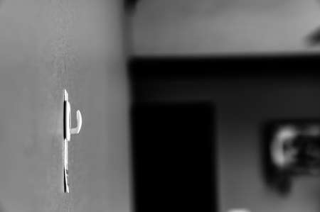 Selective focus on adhesive strip wall hanger that can be removed by pulling tapeの写真素材