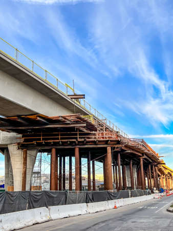 Bracing and support in place for a overhead freeway construction projectの写真素材