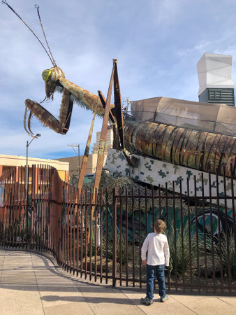 Downtown Container Park, Las Vegas, Nevada, US - 1.2020 - Praying Mantis metal art sculpture with a...