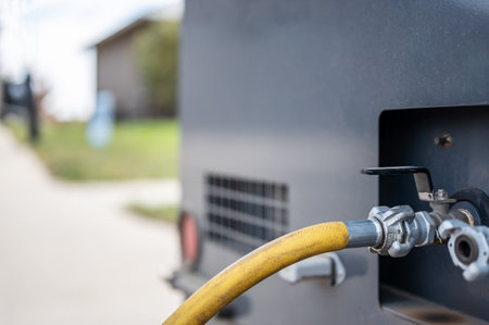 Winterizing a residential irrigation system by using a compressor and forced air to blow the lines...