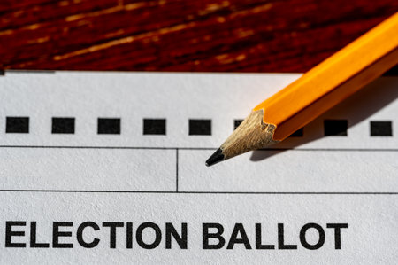 Selective focus on a generic election ballot with a pencil on top.
