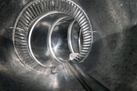 Interior view of residential HVAC galvanized metal duct pipingの写真素材