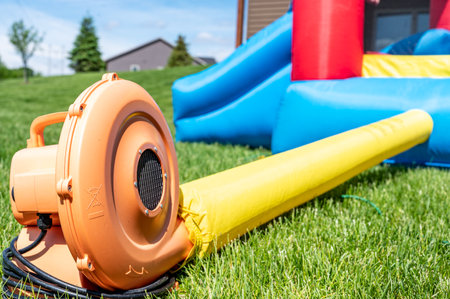 Subject focus on bouncy house blower fanの写真素材