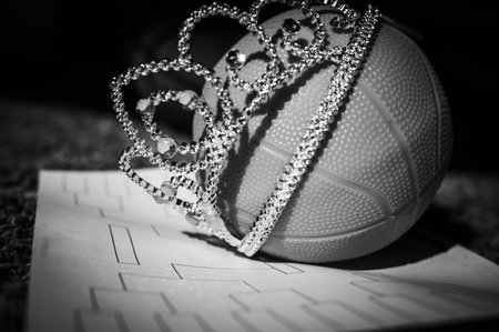 Basketball, tiara, and blank bracket signifying a Cinderella season.の写真素材