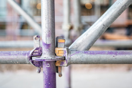 Typical cross brace supports at a connection point on an erected scaffold.の写真素材