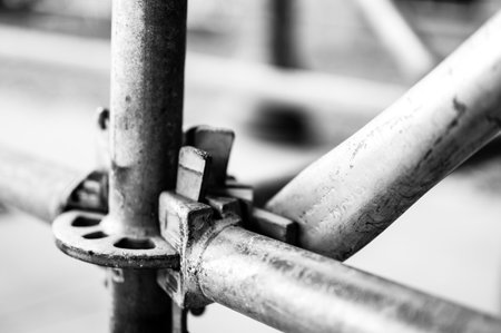 Typical cross brace supports at a connection point on an erected scaffold.の写真素材