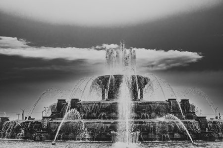 Chicago Buckingham fountain in Grant Park in the morning with cloud and blue sky.の写真素材