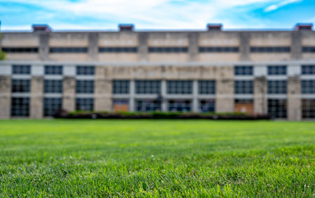 Lawrence, Kansas, USA - 7.2023 - selective focus on grassed area in front of Allen Fieldhouse where the University of Kansas Jayhawks play basketball.のeditorial素材