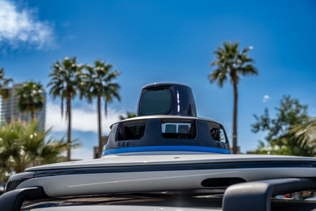 Phoenix, Arizona, USA - 3.23.2024: Rooftop sensor on a Waymo self-driving car.のeditorial素材