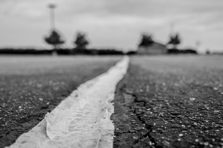 fabric coving on top of an asphalt crack repair
