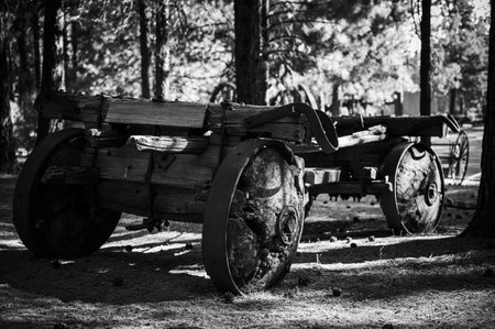 Chiloquin, Oregon - 8.8.2023 - Wagon with wooden wheels on display at the Collier Memorial State Park Logging Museumのeditorial素材