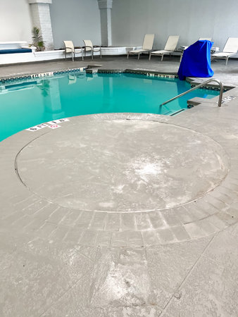 Filled in section of concrete where a hot tub whirlpool was removed at a hotel.の写真素材