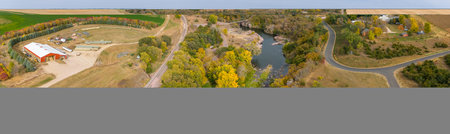 Drone flying over Split Rock Creek running through Palisades State Park in Garretson, South Dakotaの写真素材