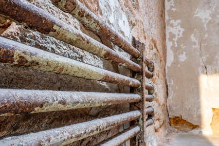Aged cell steam radiator at Eastern State Penitentiary historic site.の写真素材