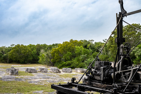 Quarrying machine next to the stone edge at Windley Key Fossil Reef Geological State Park in Islamorada, Floridaの写真素材