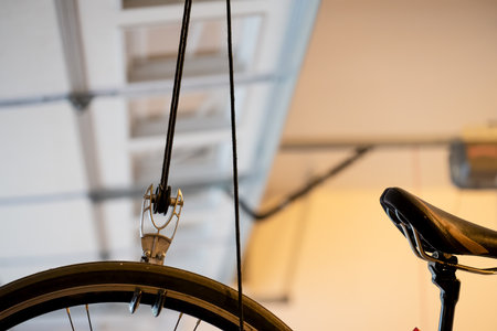 Hoist and pulley system to store a bike on the ceiling of a garage.の写真素材