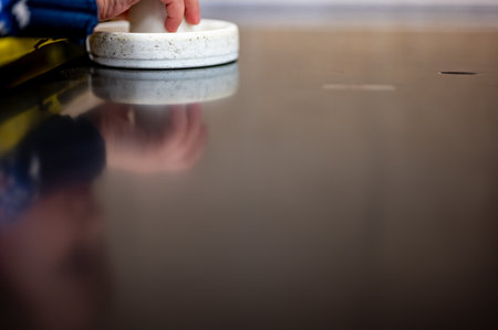 Selective focus on an air hockey table.