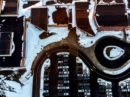Aerial view of a parking lot in the winter with snowの写真素材