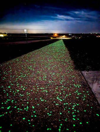 A section glow-in-the-dark concrete sidewalk along Nathans Miles Glow Trail in Vinton, Iowa, USAの写真素材
