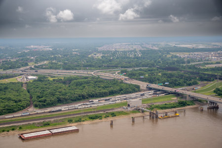 High view of barge, train, and road transportation and commerceの写真素材