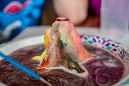 Home science experiment using baking soda and acid to form an eruptionの写真素材