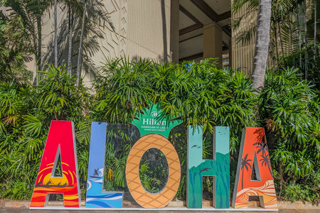 Hawaii, USA - 4.19.2025: Sign welcoming guests with ALOHA at Hilton Hawaiian Village in Waikiki Beach