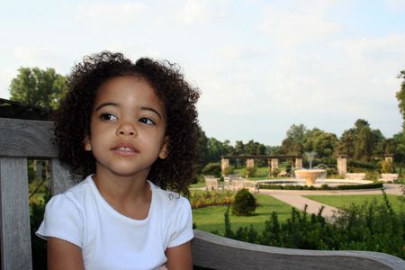 Beautiful young girl outside in the parkの写真素材