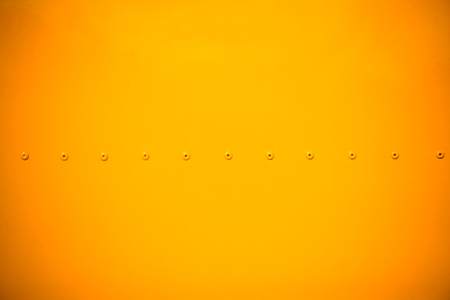yellow metal sheet with dark vignette free copy space for text,の写真素材