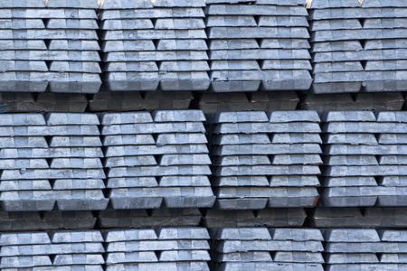 heap of aluminium bar, raw material aluminum ingots in steel factoryの写真素材