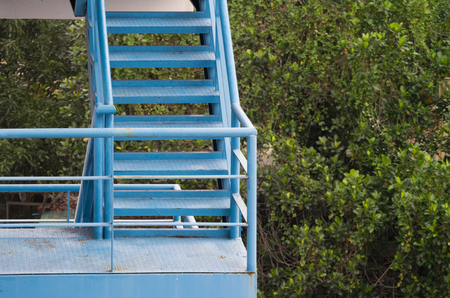 blue steel stair outside of building, fire exit stairの写真素材
